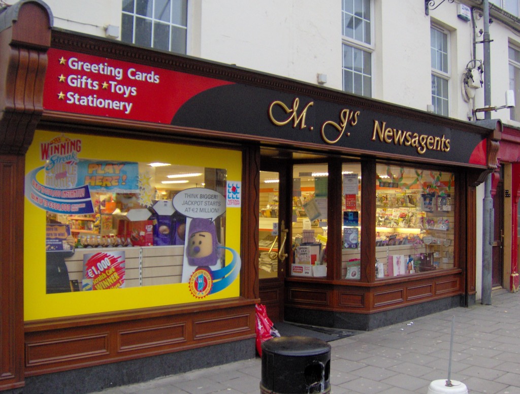 Image of a Traditional Wooden Shopfront Sign - MJ's Newsagents Cootehill Cavan